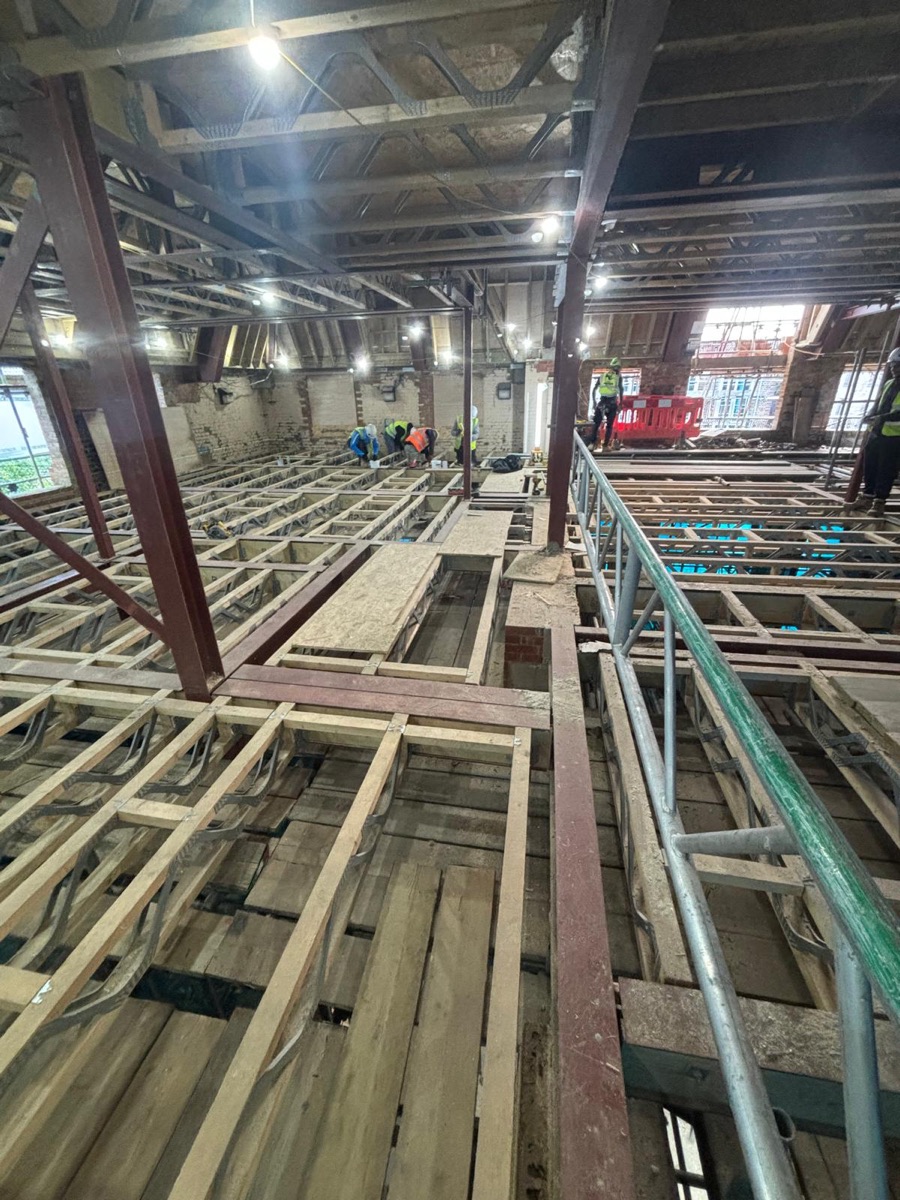 Timber floor structure and steel beams inside a heritage building refurbishment